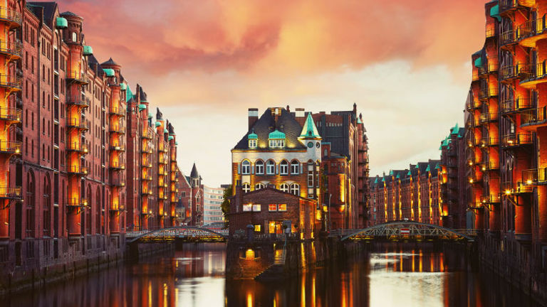 Take a boat tour through Hamburg, Germany's historic Speicherstadt warehouse district. // © 2018 Getty Images